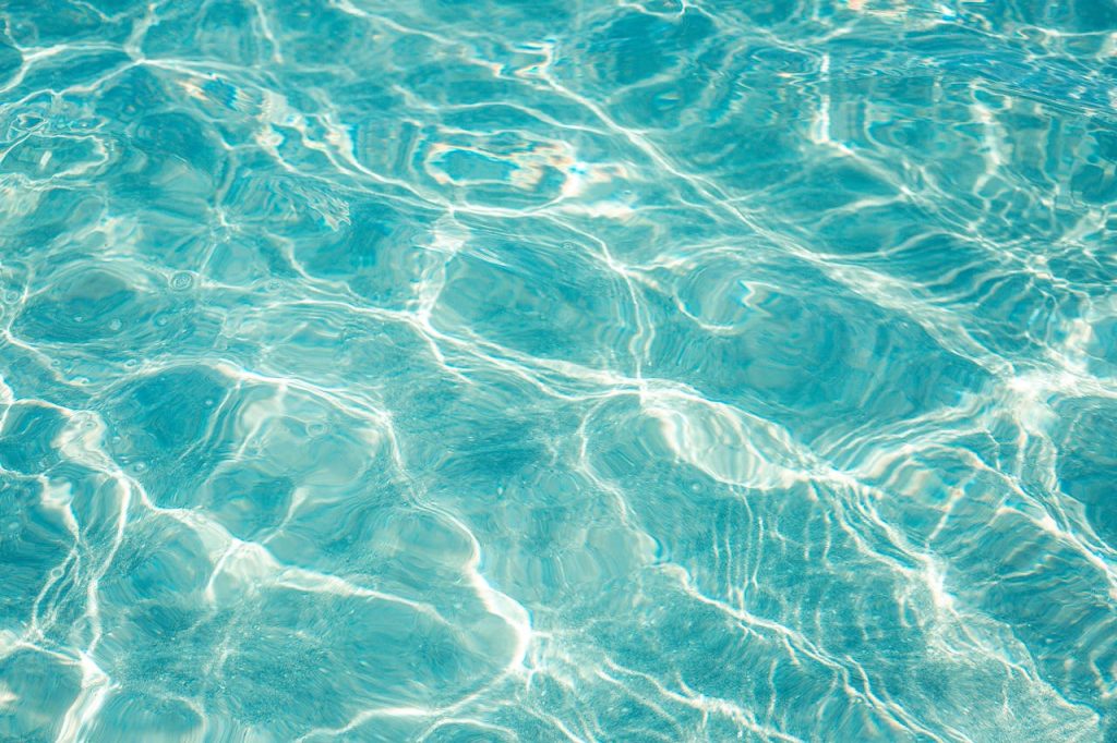 A close-up of a clean pool water surface for water testing kit usage to measure water quality.